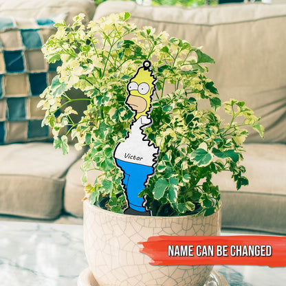 365Gifty personalized Christmas acrylic ornament featuring cartoon character Homer Simpson hanging on a green potted plant