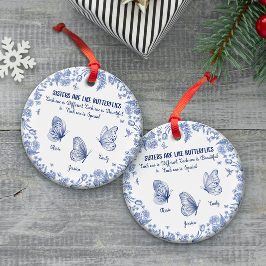 personalized sister ornament round white ceramic with blue butterfly design red ribbon custom names printed