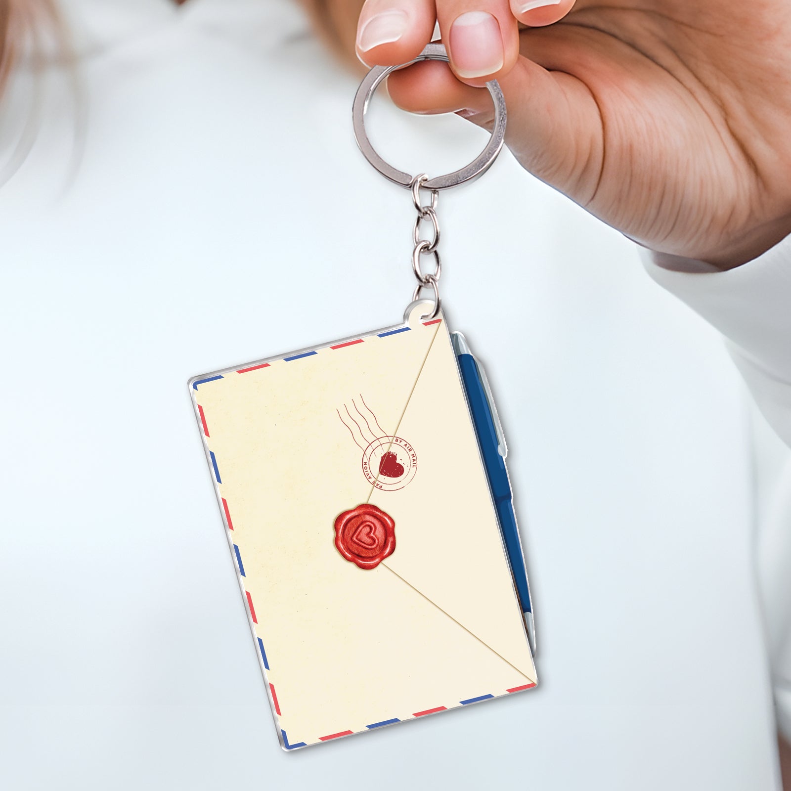 Slider Card Keychain For Bestie featuring a vintage envelope design with red wax seal held by hand