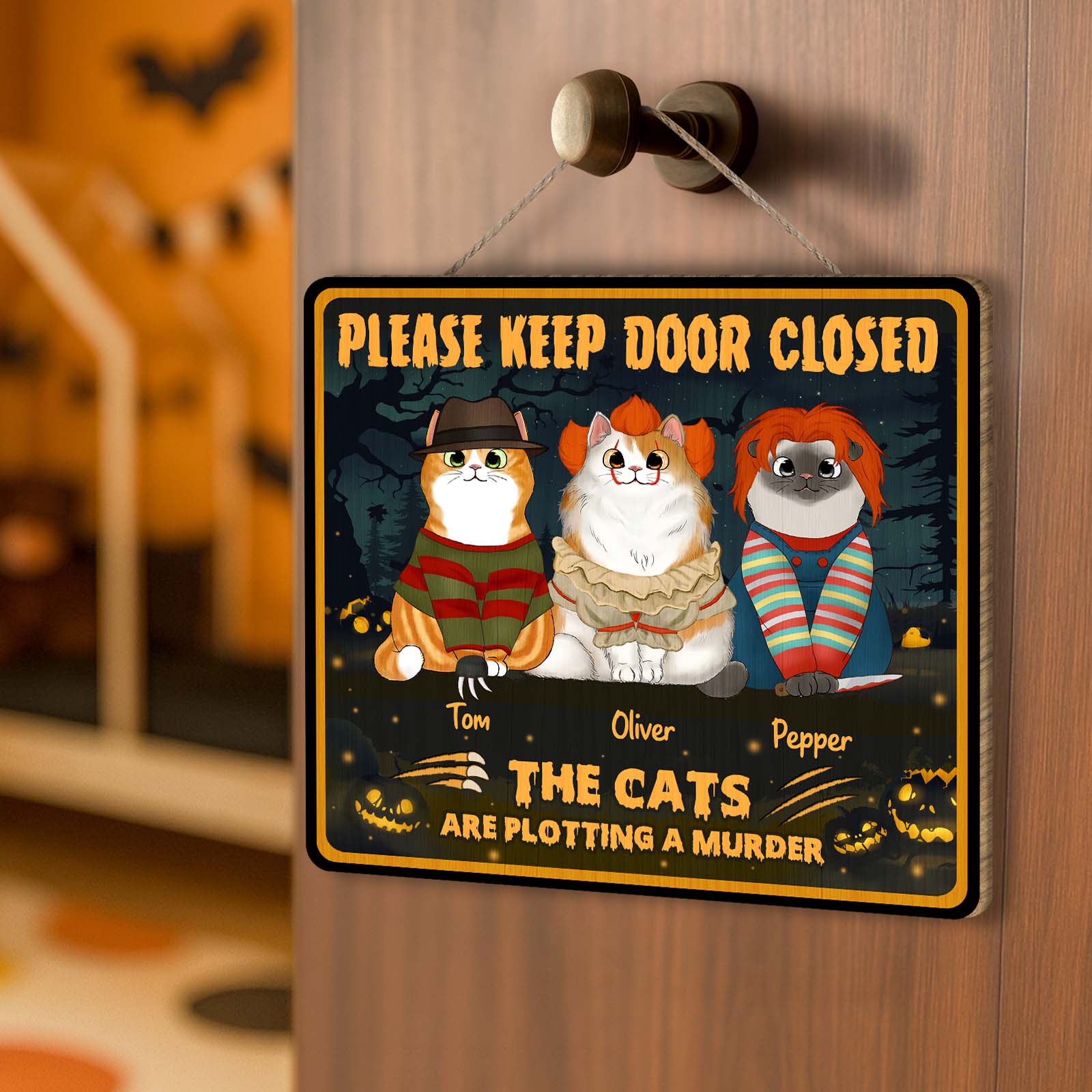 Halloween personalized cat door sign hanging on door knob with three cats in spooky costumes and names Tom Oliver Pepper