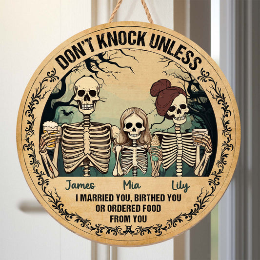 personalized Halloween wooden door sign round plaque with three skeletons names James Mia Lily and funny dont knock