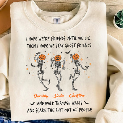 Cream custom best friend Halloween sweatshirt with three dancing skeletons with pumpkin heads and personalized names