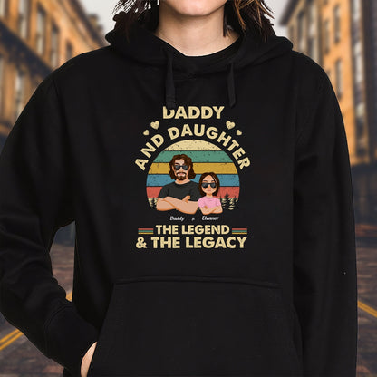 Black hoodie featuring daddy and daughter design with the legend and the legacy shirt text