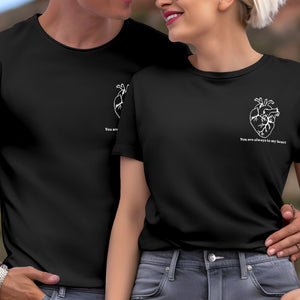 Couple wearing black custom apparel t-shirts with heart design and You Are Always In My Heart text unique couples gift custom apparel