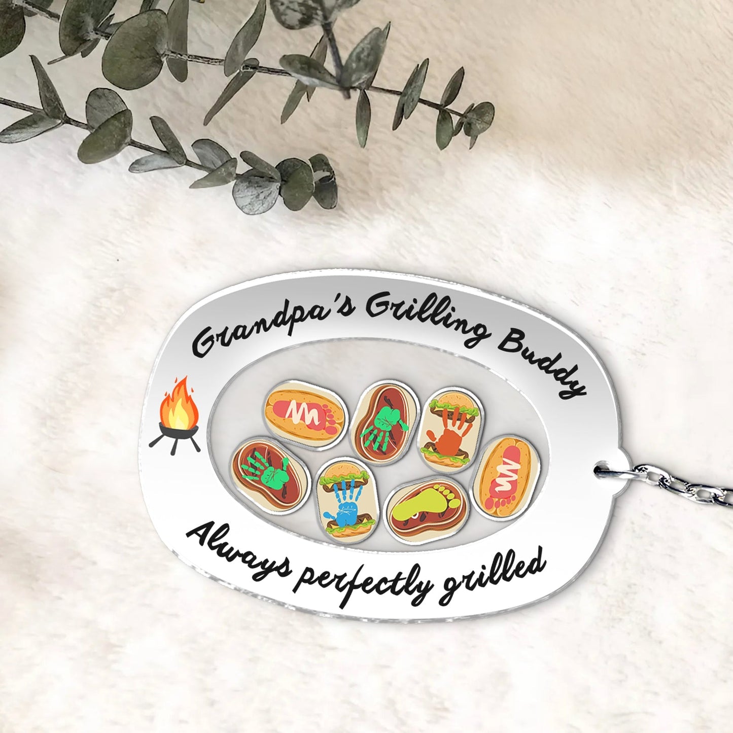Unique Father's Day keychain featuring 'Grandpa's Grilling Buddy' design with colorful grill-themed icons