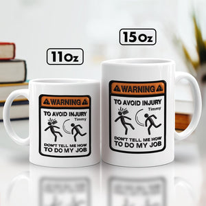 Unique workplace humor gift coffee mug with warning sign and funny message about not telling how to do the job
