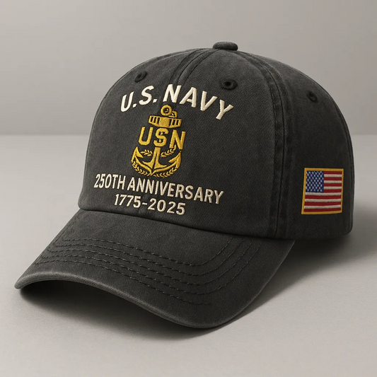 Black U.S. Navy 250th Anniversary cap with embroidered gold emblem and US flag patch on side