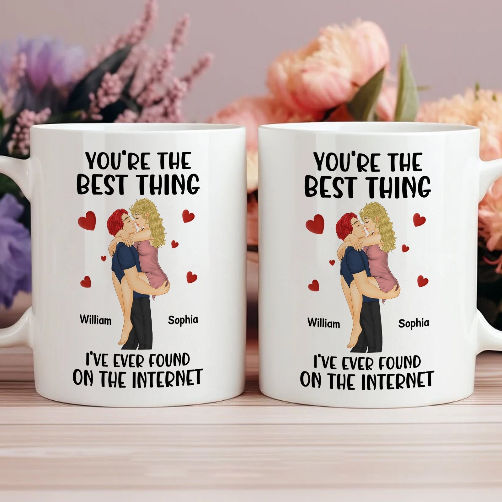 White coffee mugs with cartoon couple hugging and text you're the best thing I've ever found on the internet