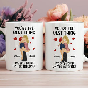 White coffee mugs with cartoon couple hugging and text you're the best thing I've ever found on the internet